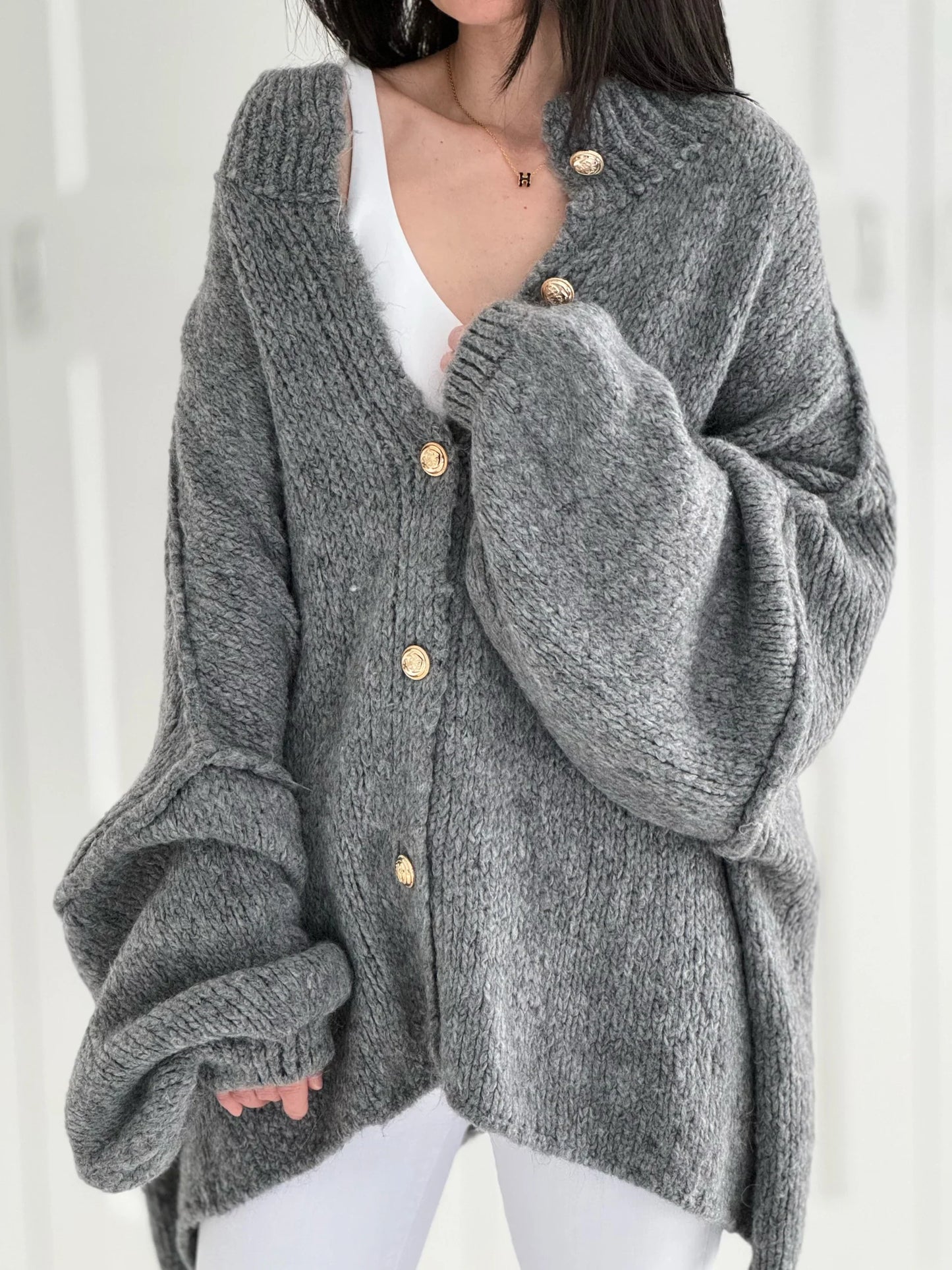 Oversize cardigan with golden buttons