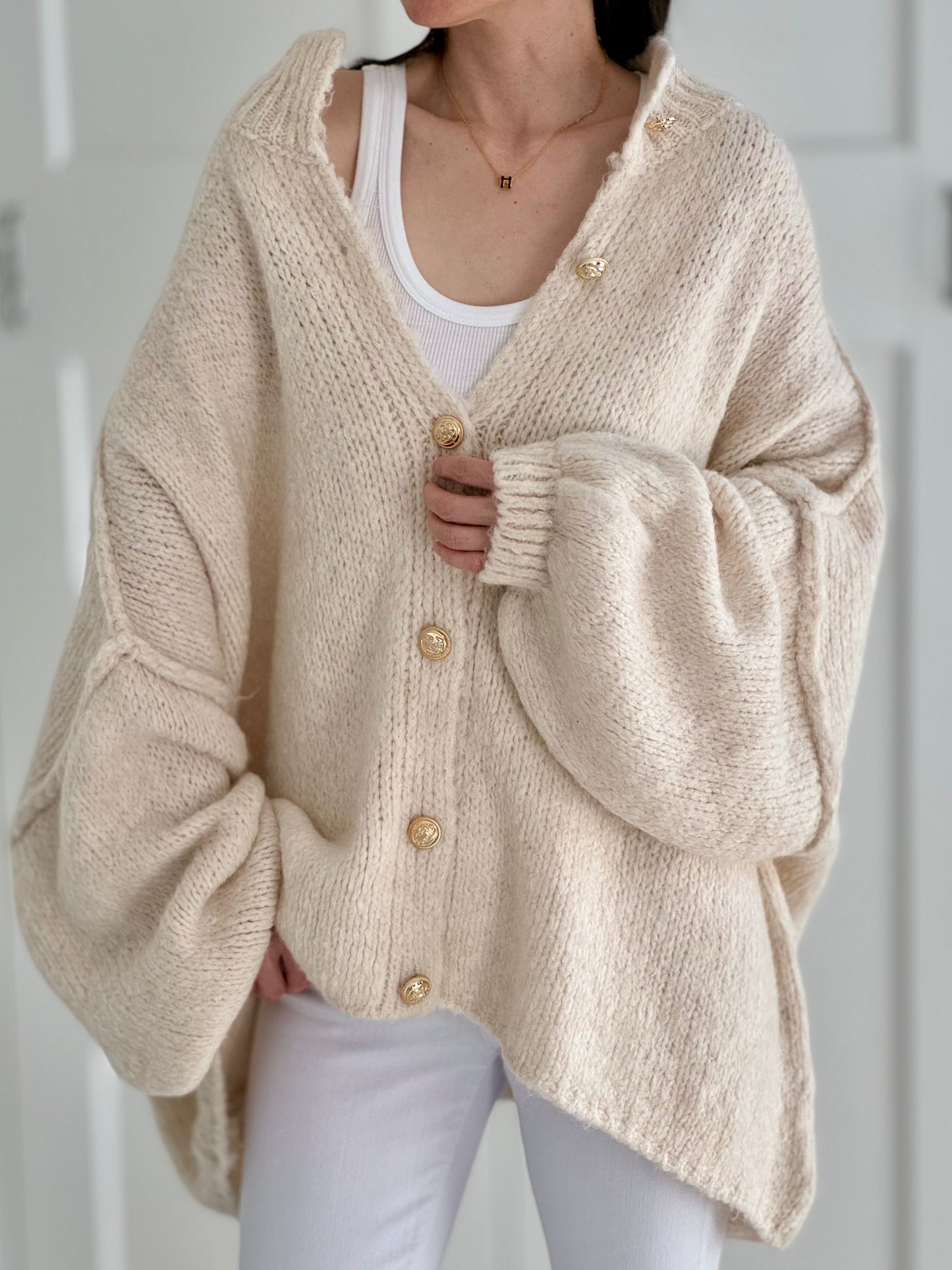 Oversize cardigan with golden buttons